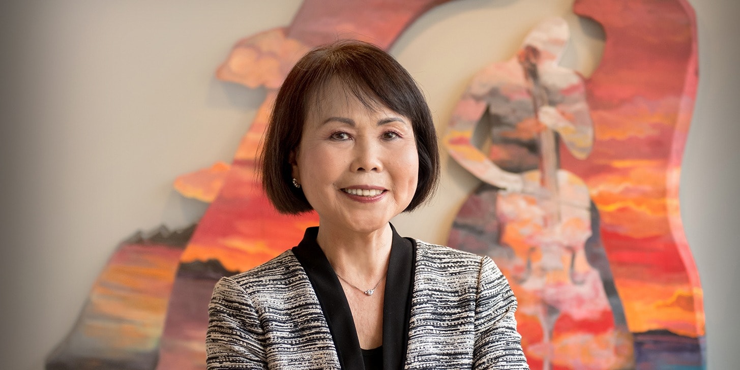 Professional portrait of smiling Asian woman   